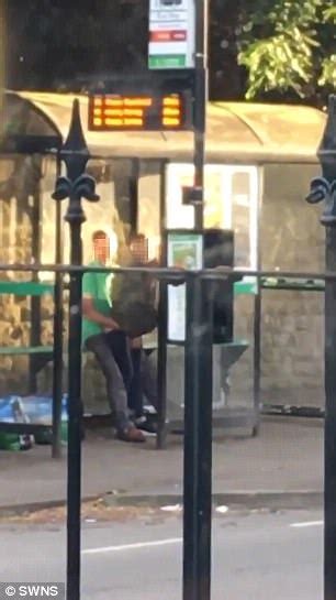 couple filmed having sex at a busy bus stop in daytime