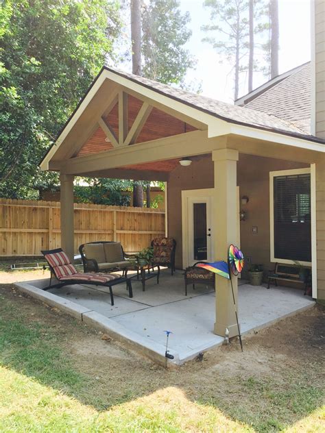 gable roof patio cover  wood stained ceiling covered patio design concrete patio patio