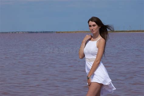 hot brunette posing near the lake stock image image of curvy pretty
