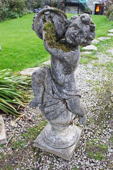 antiques atlas  classical garden statue figures  putti asa