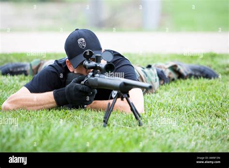 sort prison swat team sniper  position observing  target sort typically handle