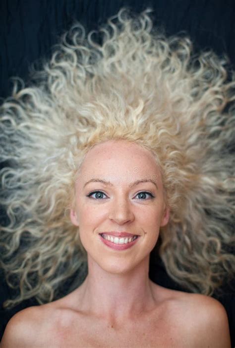 pretty wild hair woman stock photo image  hairstyle