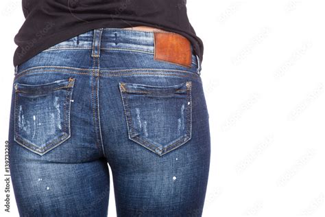 close up of sexy woman wearing blue jeans fit female butt in blue