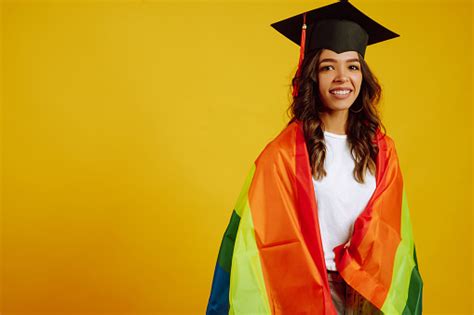 Beautiful African American Lesbian Girl In A Graduation Hat Posing With