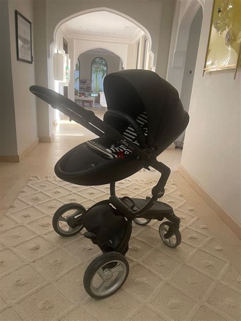 mima xari stroller black  kit mima baby car seat compatible  stroller dubizzle
