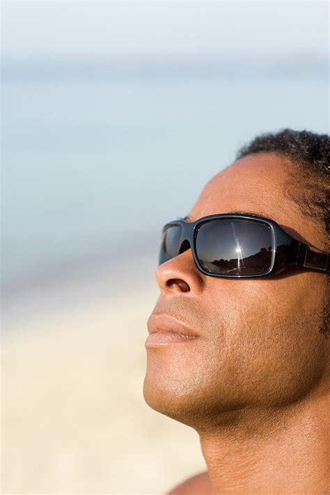 Man Wearing Sunglasses Photograph By Ian Hooton Science Photo Library