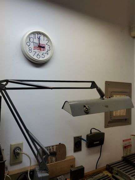 swing arm light spartus battery operated wall clock small mirror bid assets  auctions