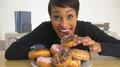 eating doughnut fabwoman news style living content