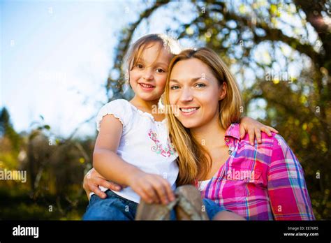 Portrait Of Mother And Daughter Outdoors Munich Bavaria Germany
