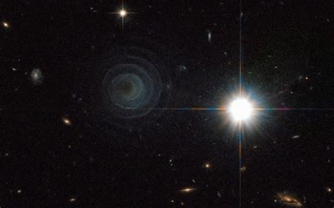Perfect Spiral Around Nebula Is Sexy Symmetry Omega Level