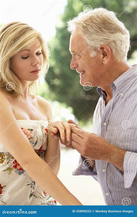 Older Man Proposing To Younger Woman Stock Image Image Of Ring