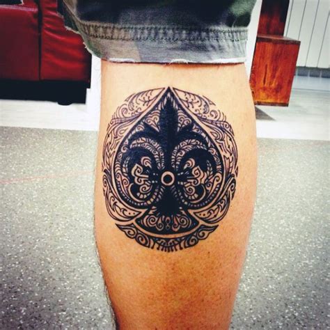gorgeous black ink spades symbol tattoo on leg tattooimages