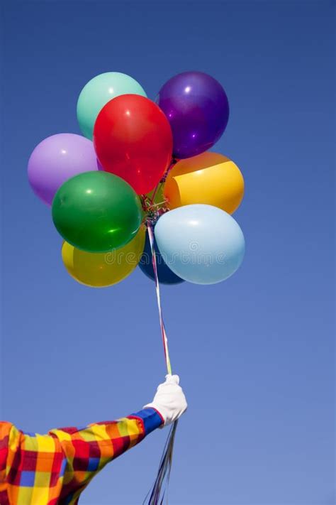 clown holding balloons stock image image  multi