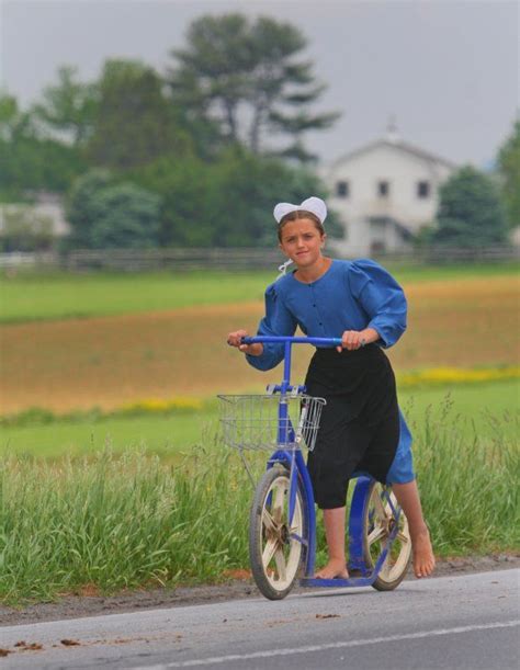 Amish Girl With Scooter Amish Amish Culture Amish Community