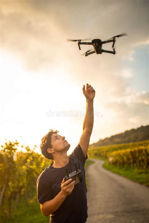 young man flying  drone stock image image  shore