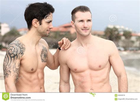 men two handsome guys on the beach stock image image of summer shirtless 69262619