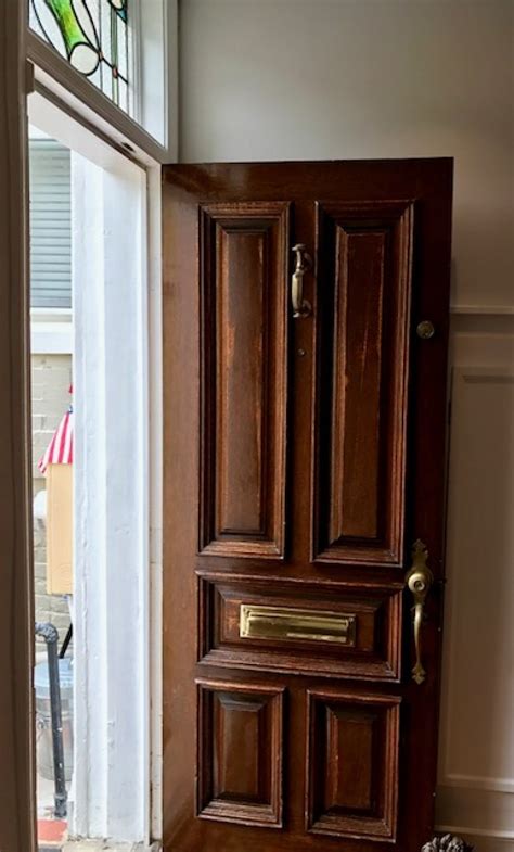 replace  wooden front door     glass