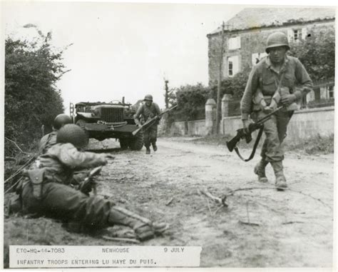 infantrymen entering  french town  july   digital collections   national wwii