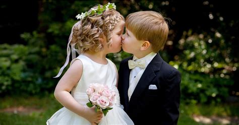 adorable flower girls  ring bearers kissing popsugar family