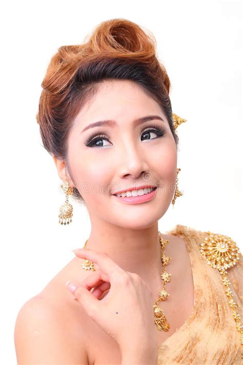 portrait beautiful thai woman in vintage thai traditional costume gold