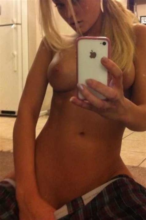 this spectacular blonde girl shows often her tits on hotmirrorpics