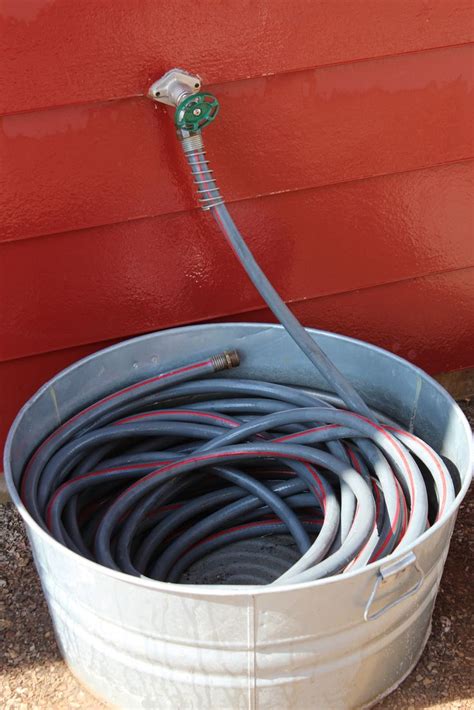 farmhouse hose holder storage solutions diy diy backyard backyard