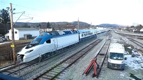 amtrak shows  sleek  acela train  action    time