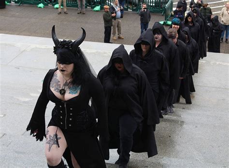 pious protesters satanists conduct  ritual   capitol steps