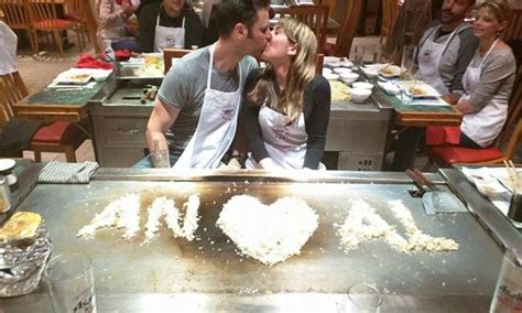 Couple Spell Out Anal In Engagement Photo At Hibachi Restaurant