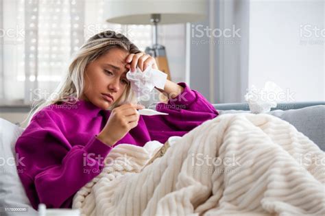 sickness seasonal virus problem concept woman being sick having flu