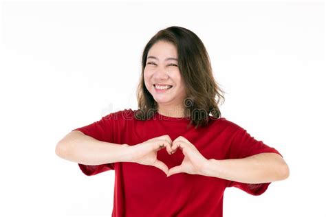 Portrait Of Middle Age 40s Asian Woman Use Your Hands To Make A Heart