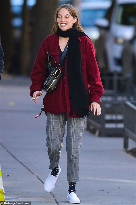 maya hawke is ready for fall in a burgundy coat and scarf as she