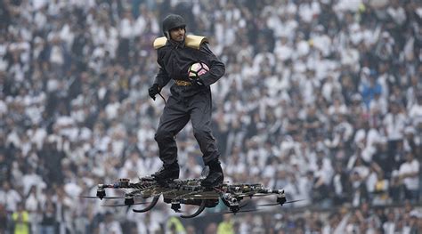 man  drone delivers soccer ball  stadium  dramatic stunt video rt sport news