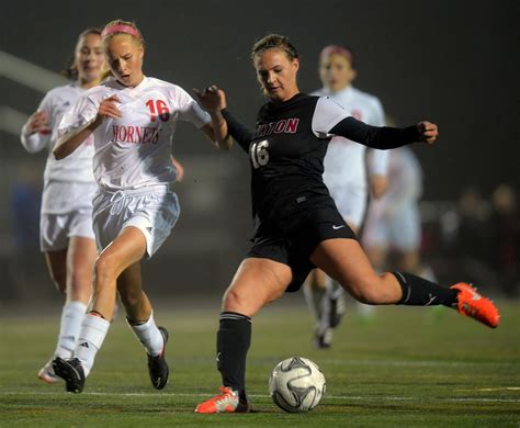 top girls soccer players face difficult choice  club high school teams  washington