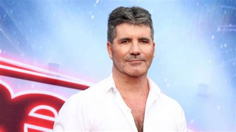 simon cowell wipes tears  reuniting  britains  talent