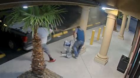 Suspects Caught On Camera Robbing Truck Pepper Spraying Victim Outside