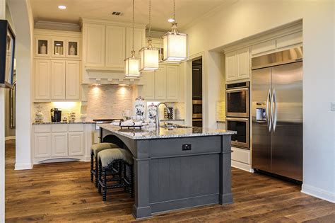 kitchen cabinets  bone white  custom wood vent hood