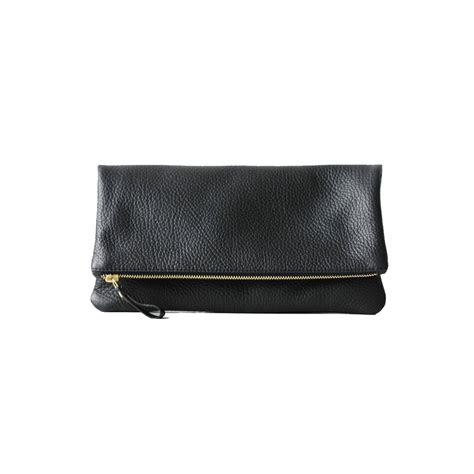 black leather foldover clutch  linen lining  mishkabags