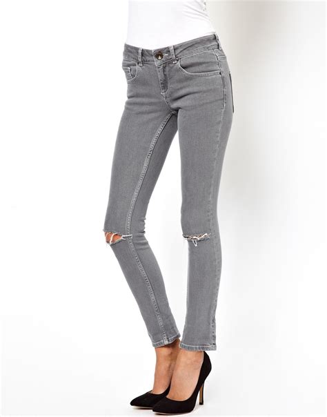 universal works asos skinny jeans in washed gray with ripped knees in