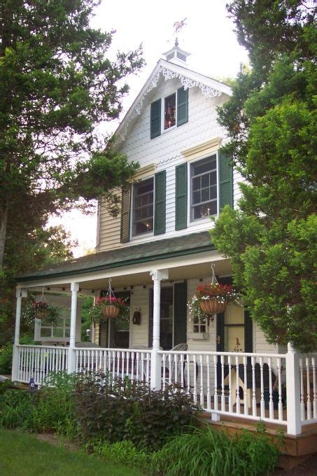 classic farmhouse  wrap  porch home exterior rate  remodel hgtv remodels