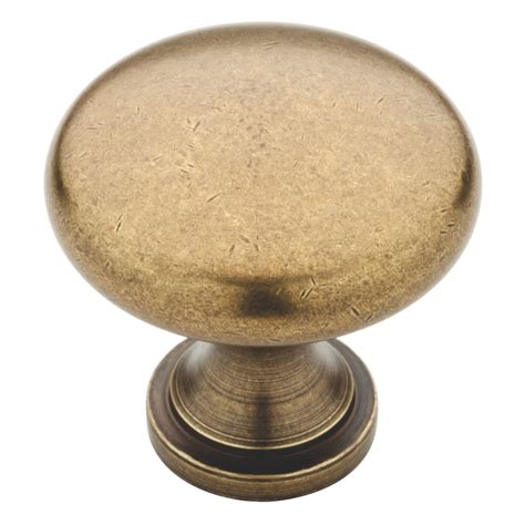 Brainerd Round Tumbled Antique Brass Round Cabinet Knob At