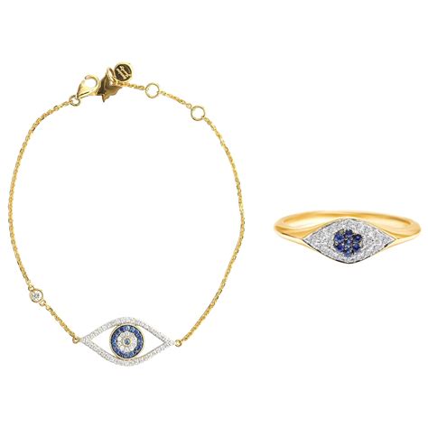 customizable evil eye ring with blue sapphire and diamond in 18 karat