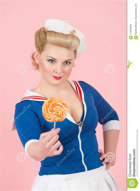 glamour pin up lady with big lollipop lollipop in hand of retro styled
