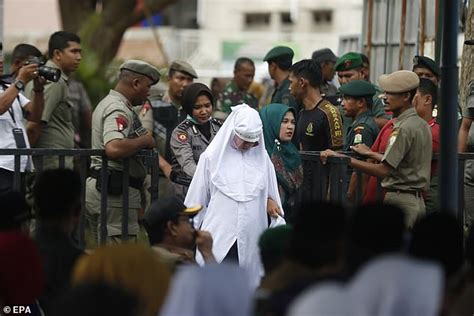 indonesia s aceh whips unmarried couples after hotel raid daily mail online