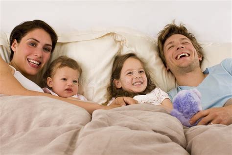 family bed stock photo image  kids people morning