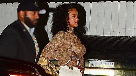 rihanna stuns in gold jumpsuit after drake s birthday