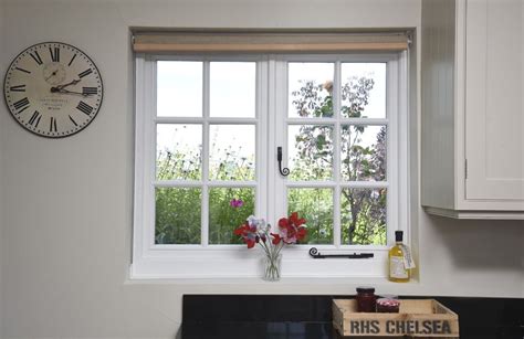 cottage casement window finished  white black monkeytail ironmongery manufactured