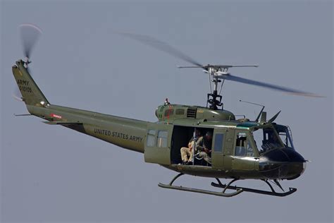 uh  huey combat support helicopter fighter jet picture