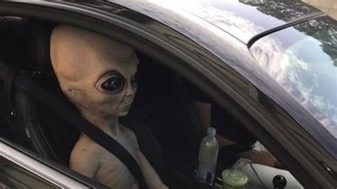 earthling police officer pulls   alien riding shotgun   real