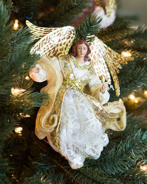 20 Beautiful Angel Christmas Decorations Lovetoknow Christmas Angel